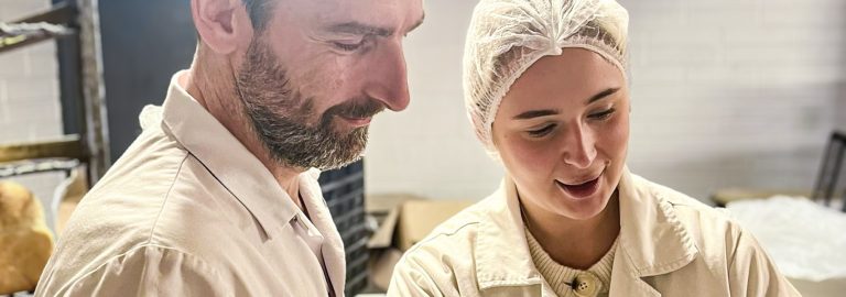 staff member being advised by food safety auditor
